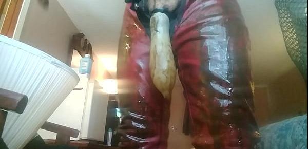  Leather farmer wearing a condom filled with piss and cum